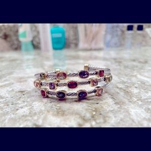 Silver costume bracelet cuff with gemstones.